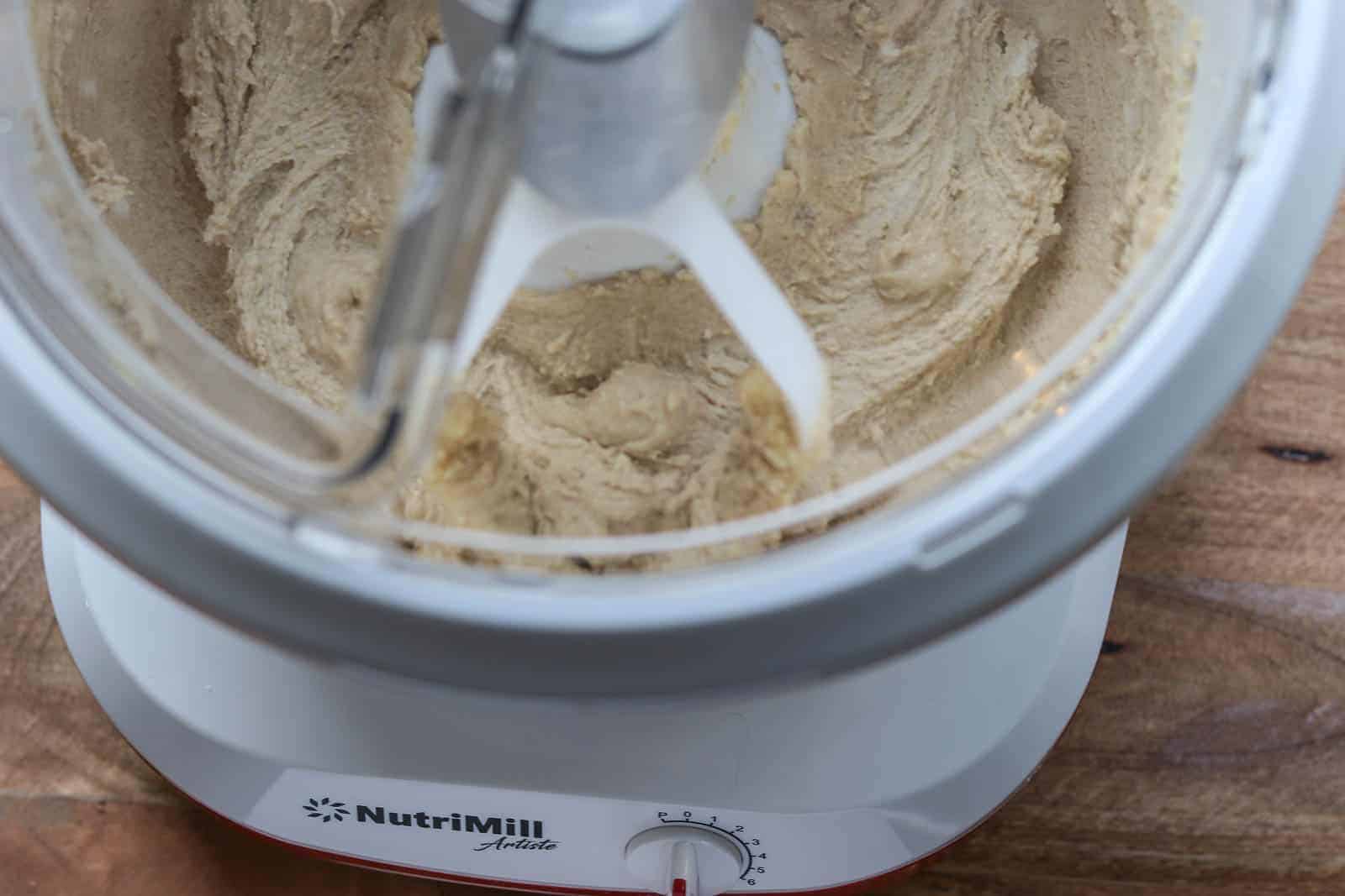 Nutrimill Artist Mixer with creamed butter, sugar and vanilla.
