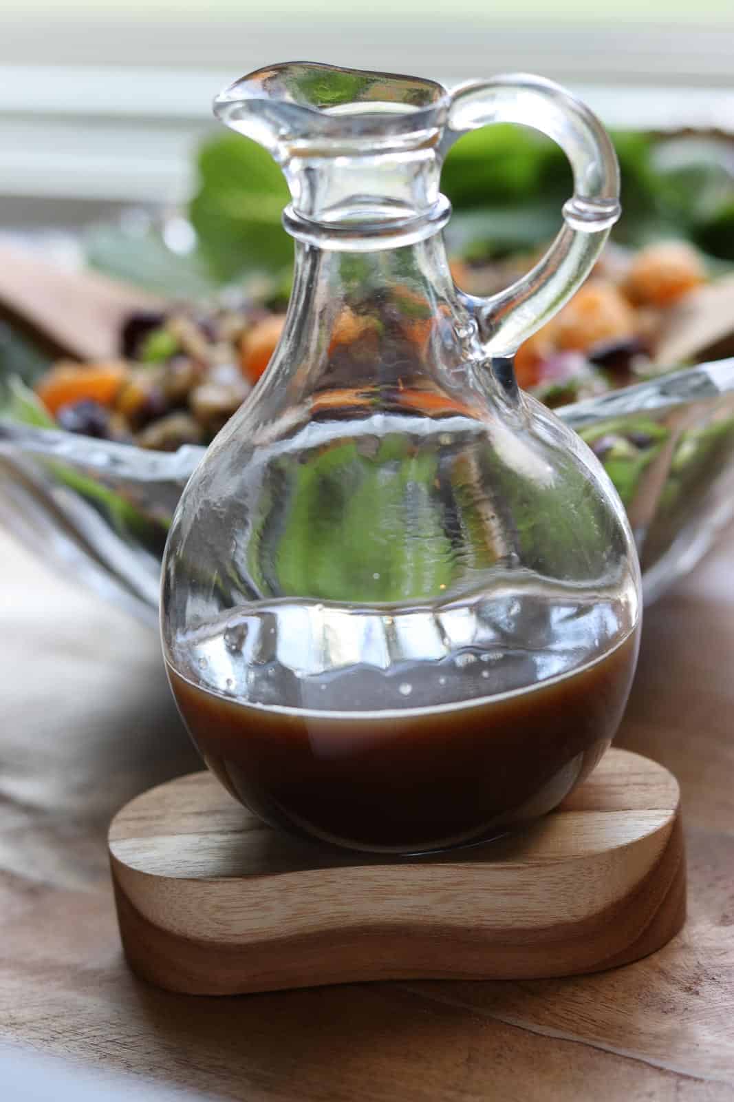 Mandarin Wild Rice Salad with Orange Vinaigrette Dressing in a glass cruet from Gourmet Done Skinny