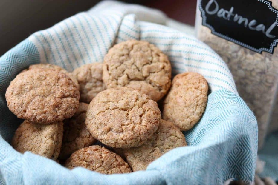 Cinnamon Oodles - Oatmeal Snickerdoodles in a basket with a blue cloth, oatmeal in background from Gourmet Done Skinny
