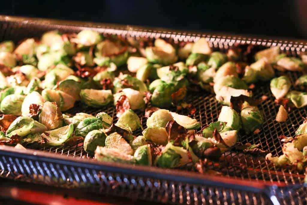 Air fried brussels sprouts in Breville Smart Oven Air -almost finished, red heating element on bottom from Gourmet Done Skinny