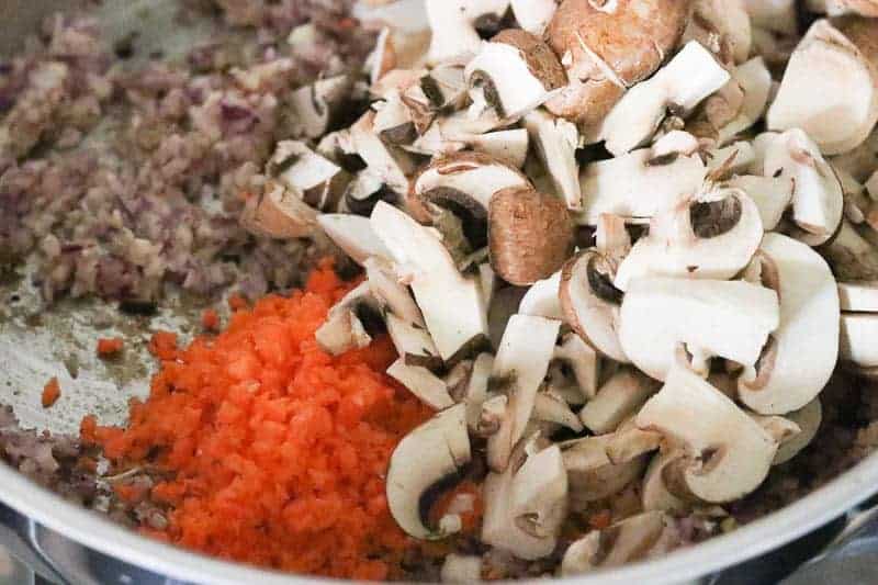 Onions, carrots, garlic and mushrooms in an Instant Pot from Gourmet Done Skinny