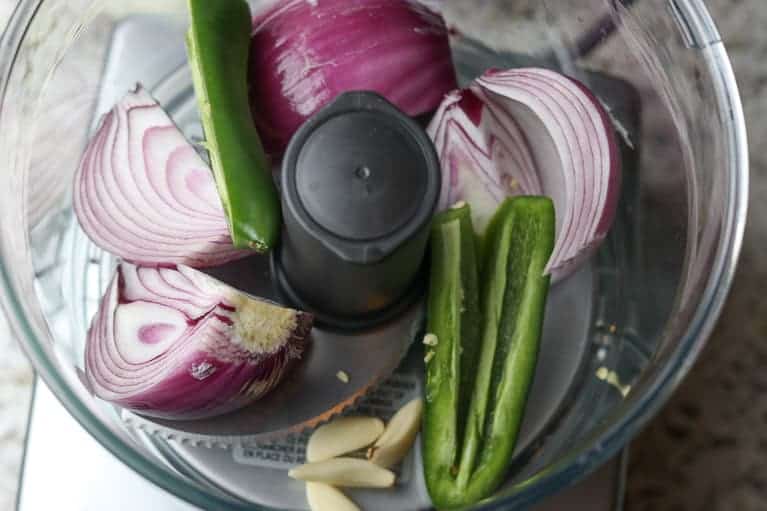 Onions, jalapenos and garlic in the Magimix food processor ready to be finely chopped from Gourmet Done Skinny