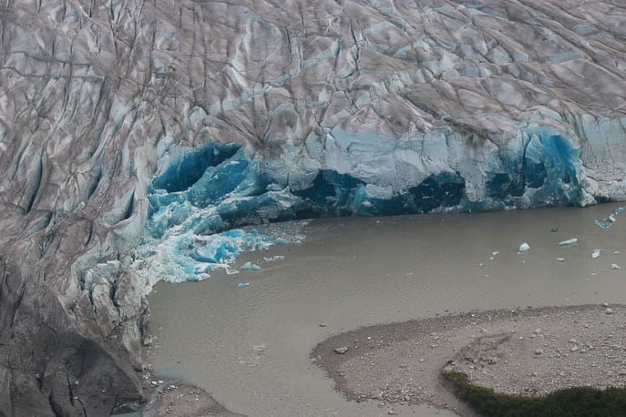 Picture of a glacier from the air, you can see the blue ice