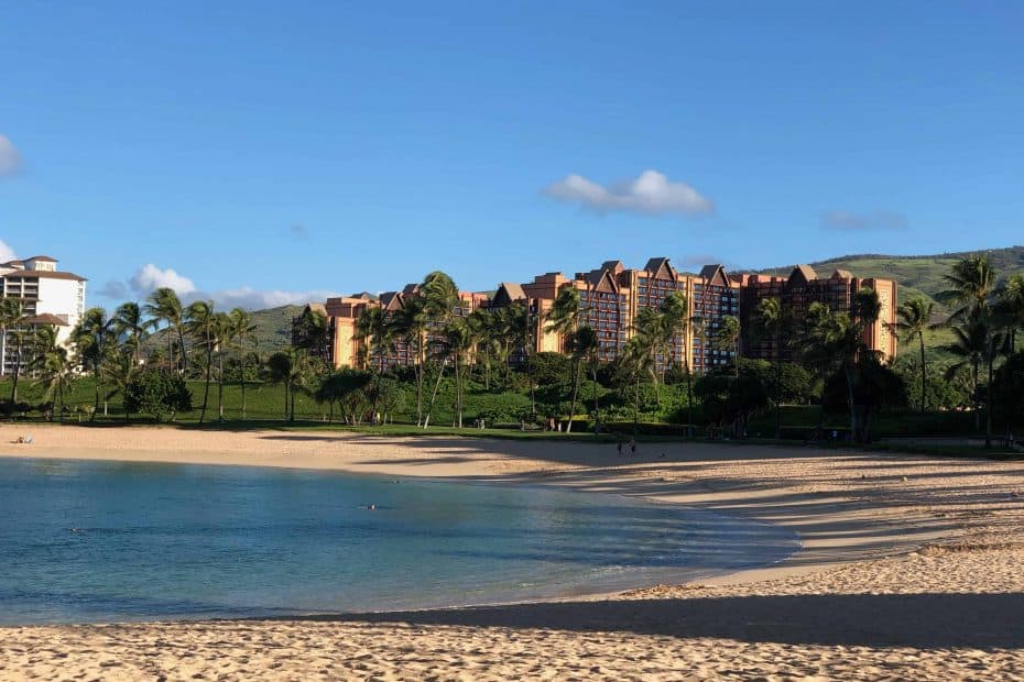 Aulani building in the background, beach and ocean in the foreground