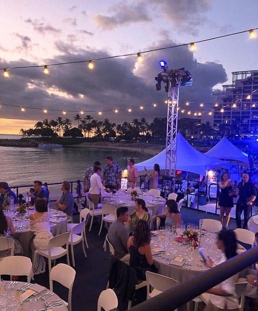 Hawaiian Food and Wine festival-tables, tents, people on the beach from Gourmet Done Skinny