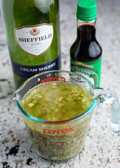 Sherry, soy sauce and ginger scallion sauce in a glass measuring cup