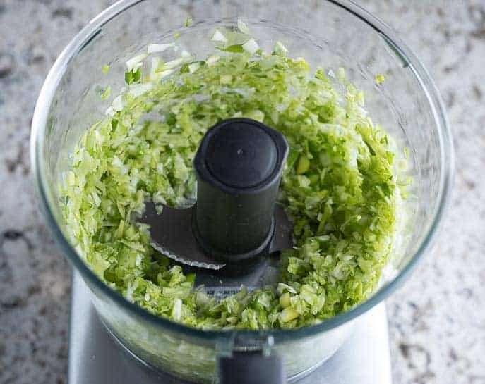 Green onion pieces in a food processor