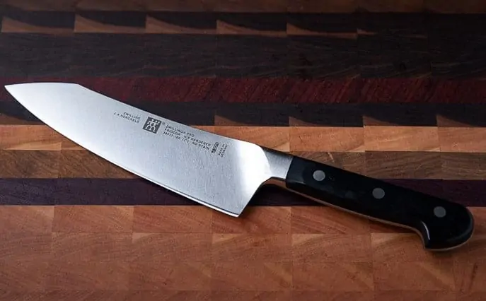 knife on a wooden cutting board