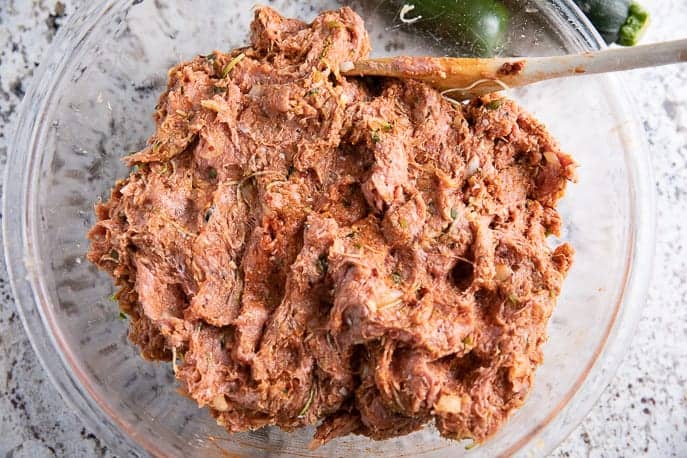 turkey slider mixture in a glass bowl with wooden spoon