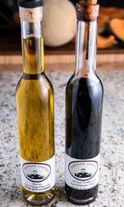 oil and vinegar on a granite counter top