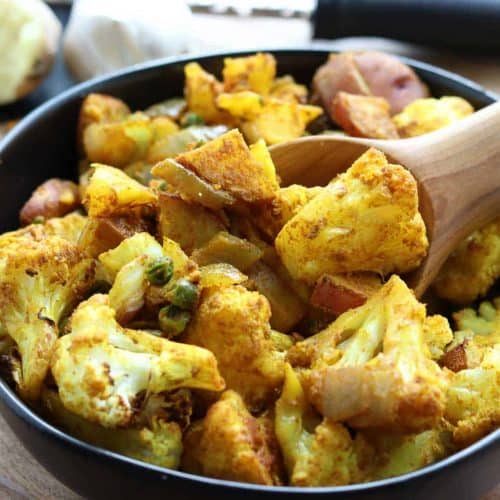 Roasted Indian Cauliflower Medley in black bowl