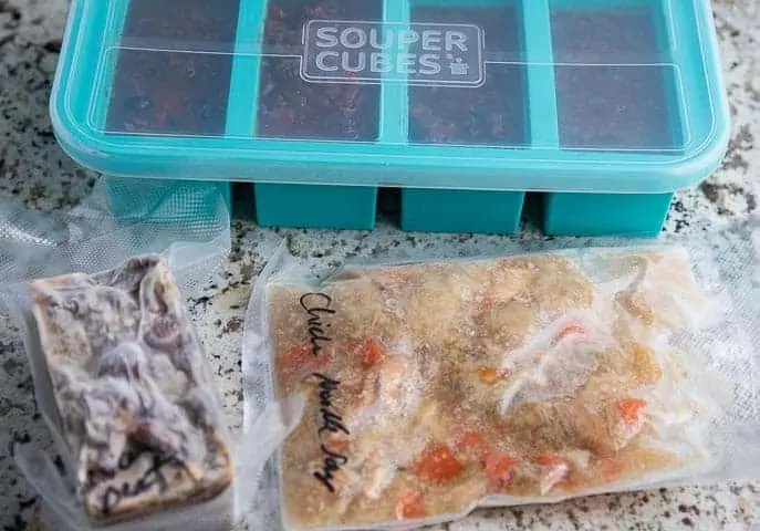 souper cubes, bags of food on counter