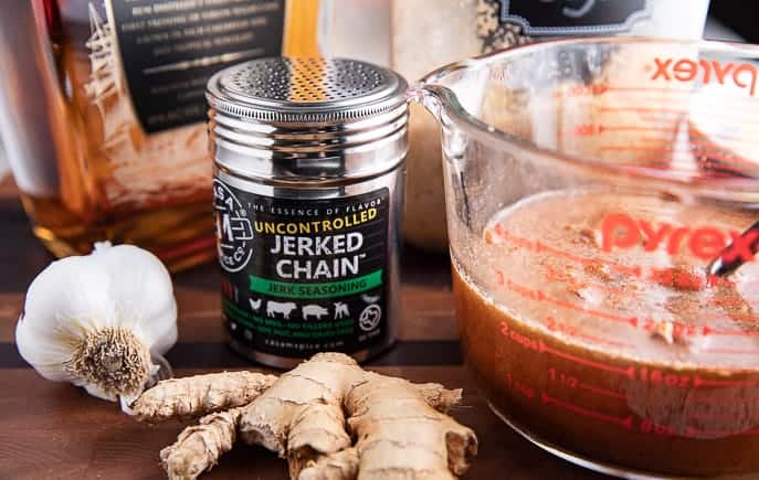 Jerked Chain spice, garlic, ginger, measuring cup with marinade