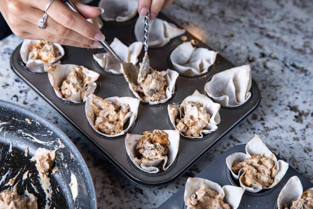 wontons in mini muffin pans with filling