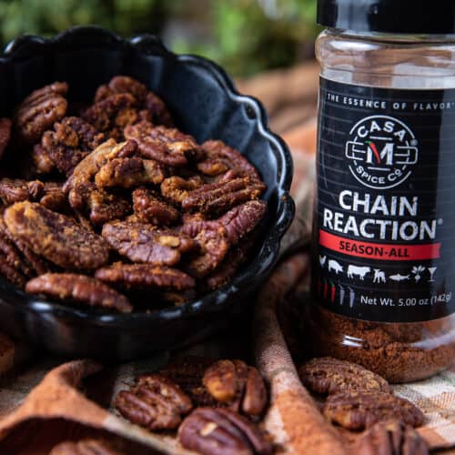 Spicy pecans in a bowl with Chain Reaction Spice