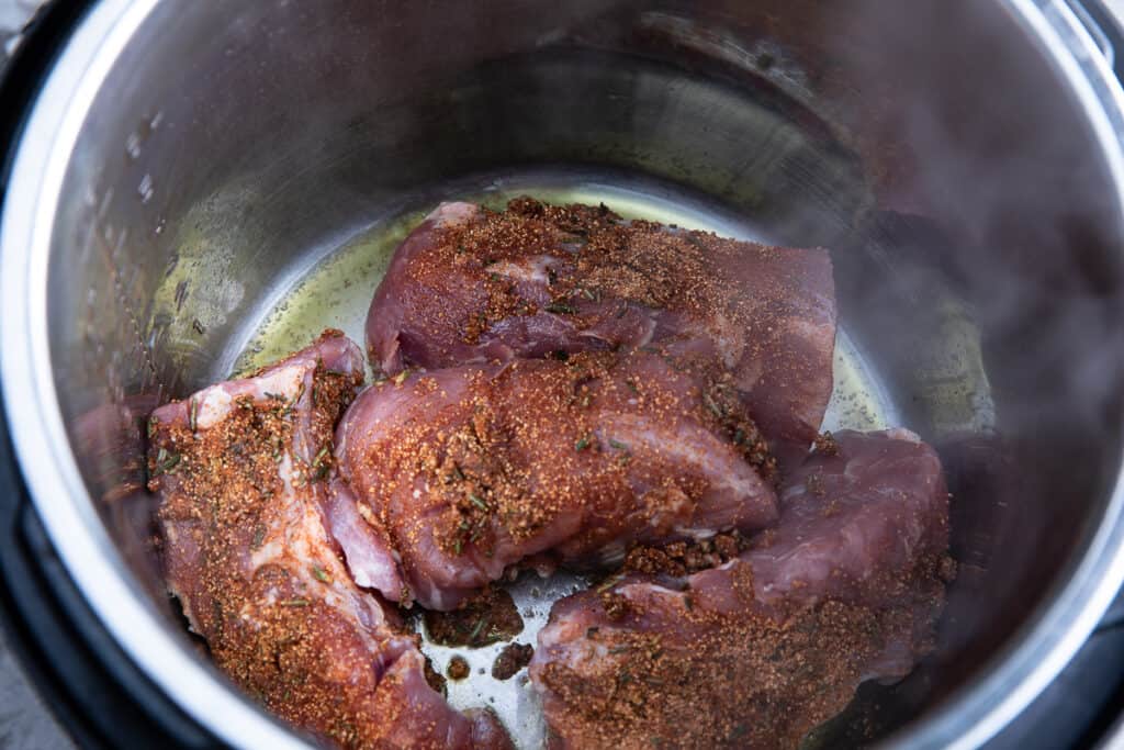pork pieces browning in Instant Pot