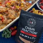 package of chain reaction spice, casserole in the background