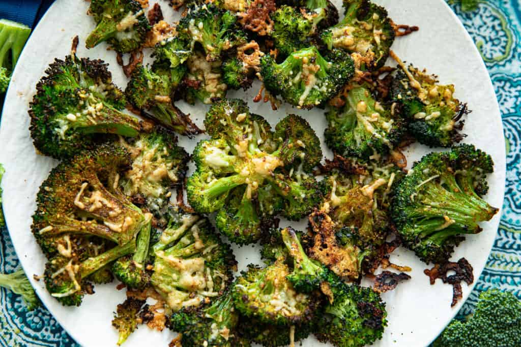 smashed broccoli on a plate