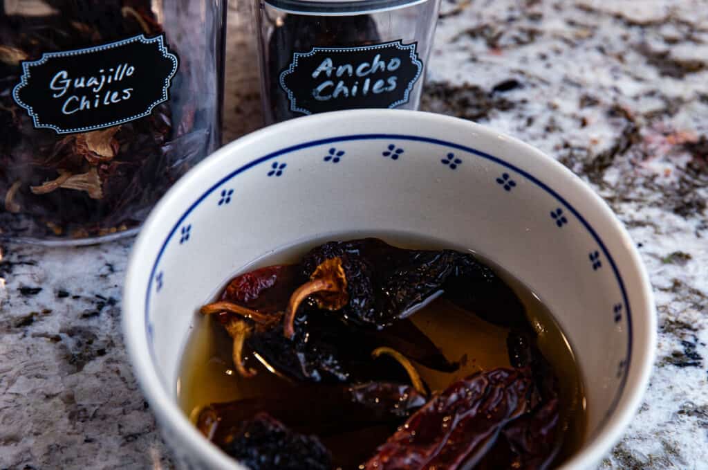chiles in a bowl with water